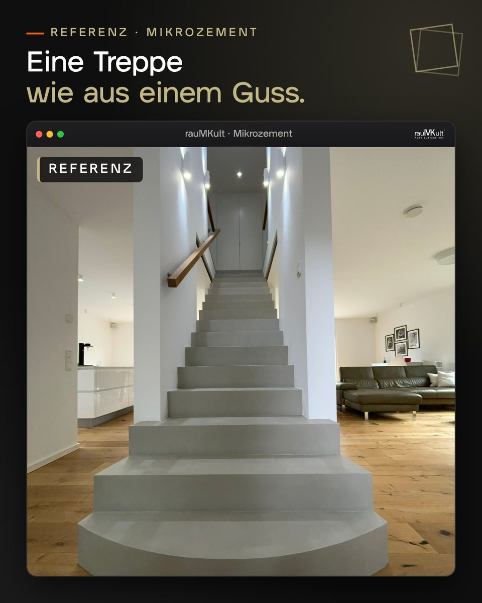 Treppe in Betonoptik aus Mikrozement von vorn, mit gerundeten Antrittsstufen und Holzhandlauf